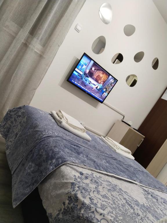 Postel nebo postele na pokoji v ubytování Studio apartman Nataly