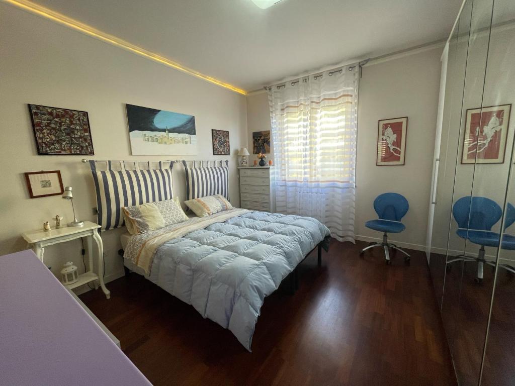 Postel nebo postele na pokoji v ubytování Camera Palazzoni