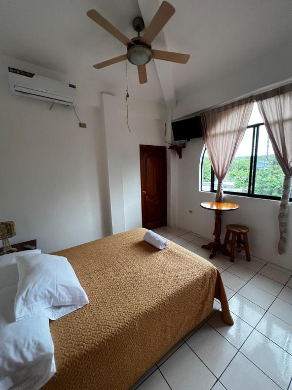 Postel nebo postele na pokoji v ubytování Casa de Nelly
