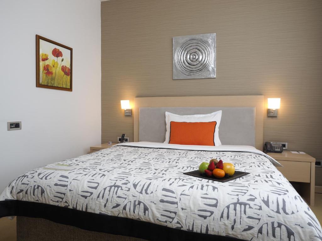 Krevet ili kreveti u jedinici u okviru objekta IN Hotel Beograd
