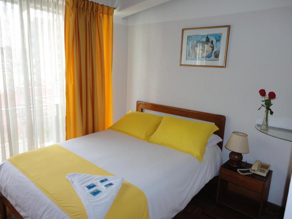 Postel nebo postele na pokoji v ubytování Hotel Rincón Escandinavo