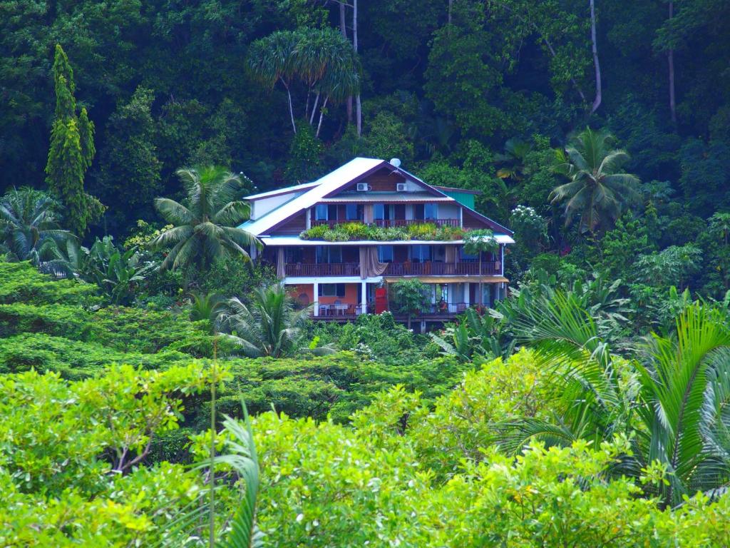 a house in the middle of a jungle at My Paradise in Baie Lazare Mahé