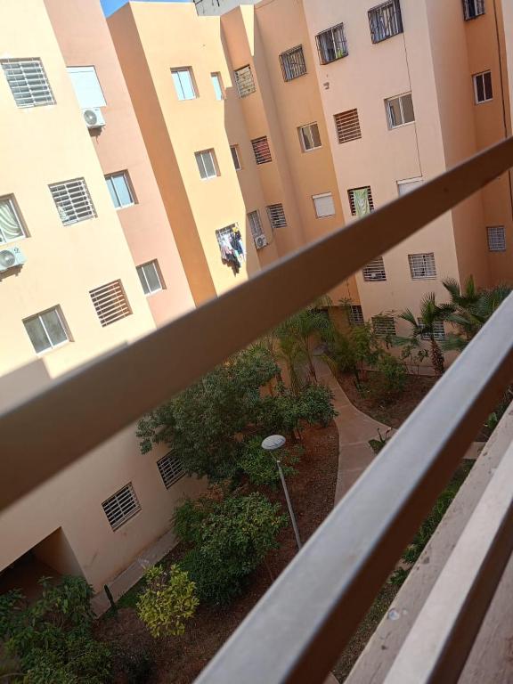 a view from the balcony of a building at appartement in Marrakesh