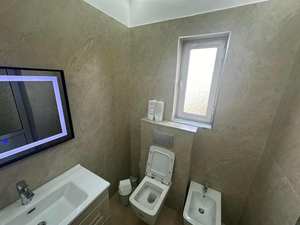 Koupelna v ubytování Algen Room's