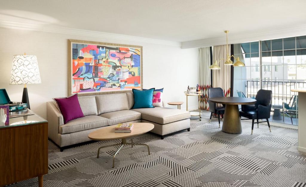 a living room with a couch and a table at Le Parc at Melrose in Los Angeles