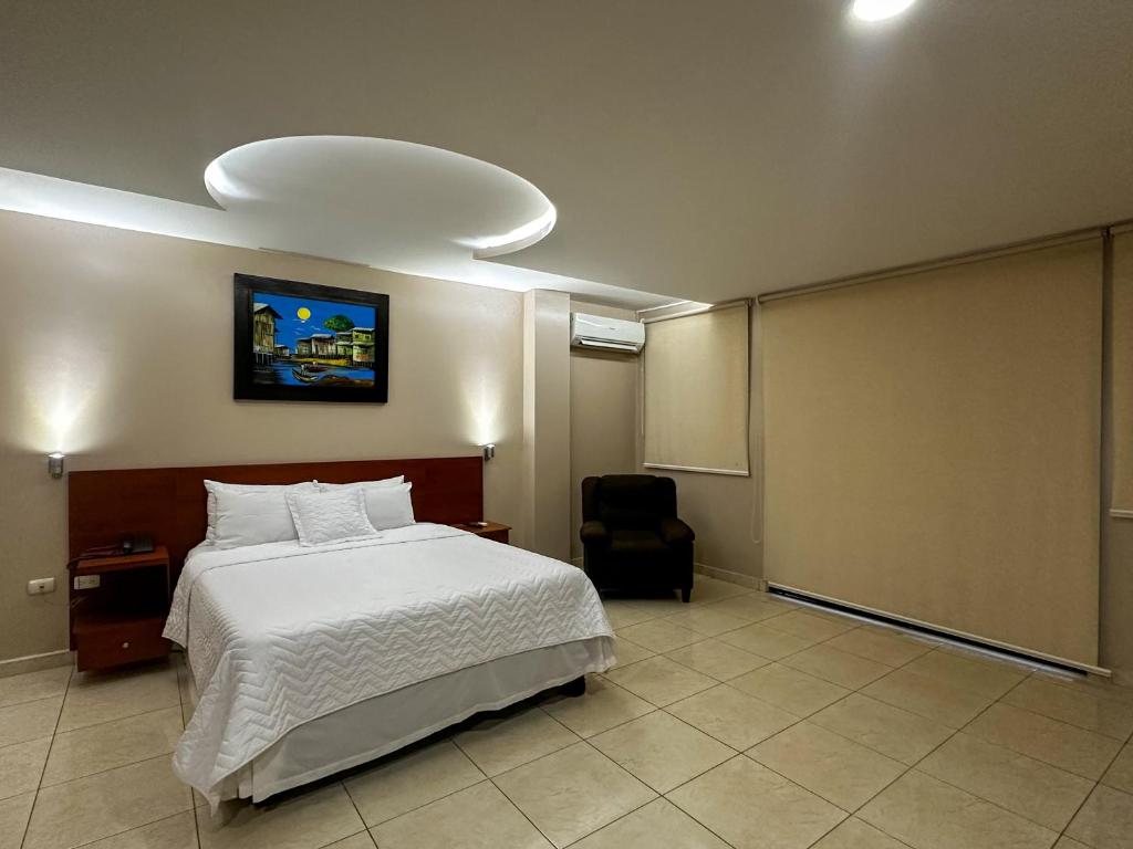 Postel nebo postele na pokoji v ubytování Hotel Bucaneiro