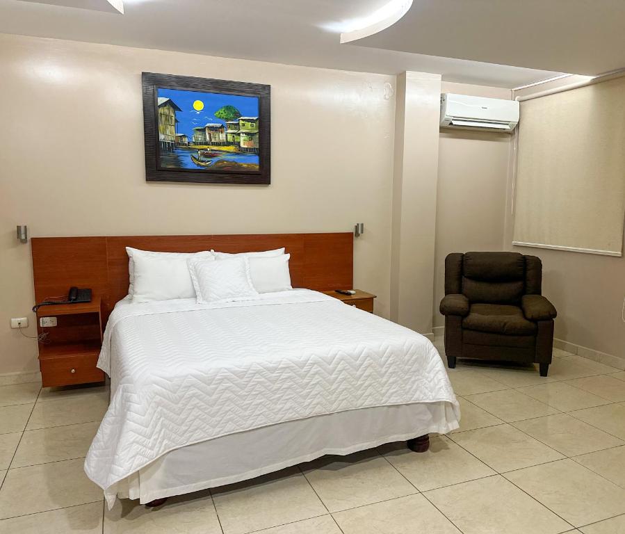 Postel nebo postele na pokoji v ubytování Hotel Bucaneiro
