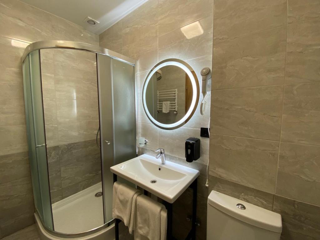 Koupelna v ubytování VATRA HOTEL