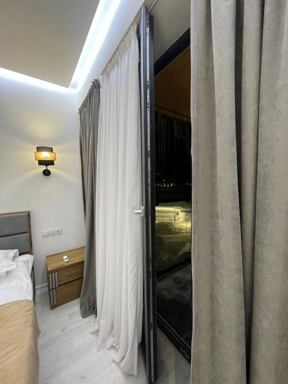 Postel nebo postele na pokoji v ubytování Hotel Peak