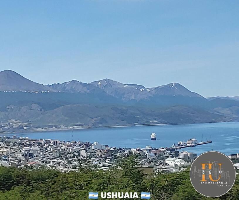 a view of a city and a body of water at Aimá in Ushuaia