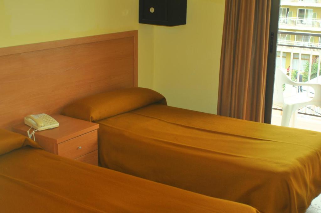 Postel nebo postele na pokoji v ubytování Raco d'en Pepe