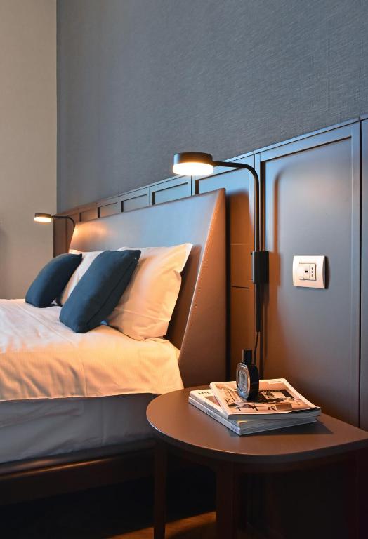 Postel nebo postele na pokoji v ubytování Villa Pioppi Hotel