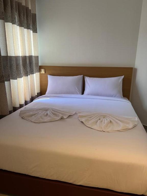 Postel nebo postele na pokoji v ubytování One Dream Hotel