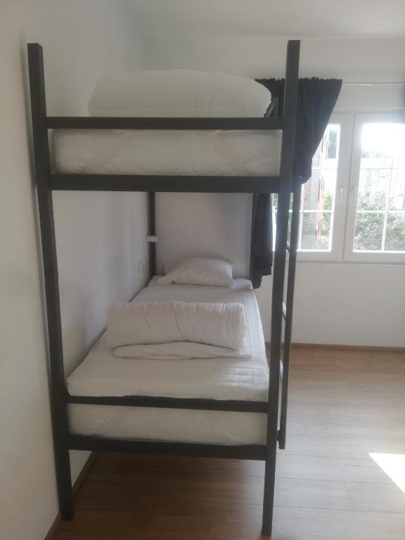 Postel nebo postele na pokoji v ubytování Hostel Vintage