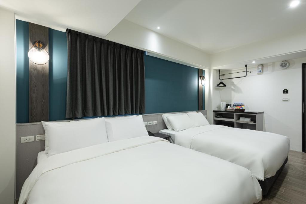Postel nebo postele na pokoji v ubytování Hotel Euphemia