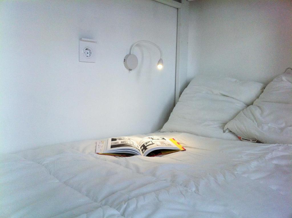 Posteľ alebo postele v izbe v ubytovaní Slow City Hostel Pontevedra