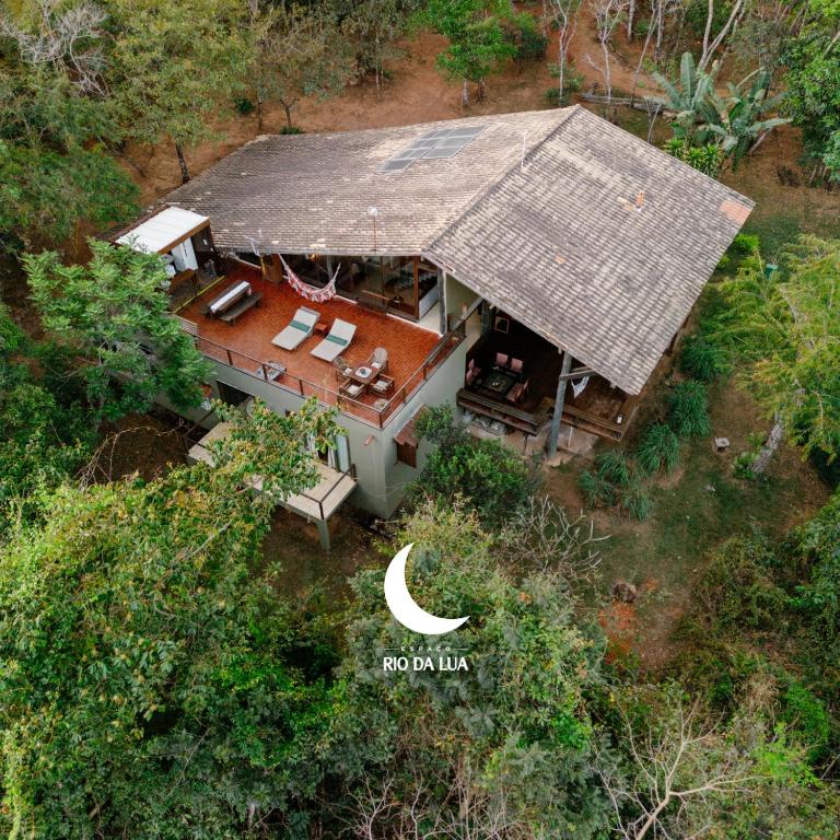 an overhead view of a house with a crescent moon at Casa da Mata - Sao Jorge GO in Sao Jorge