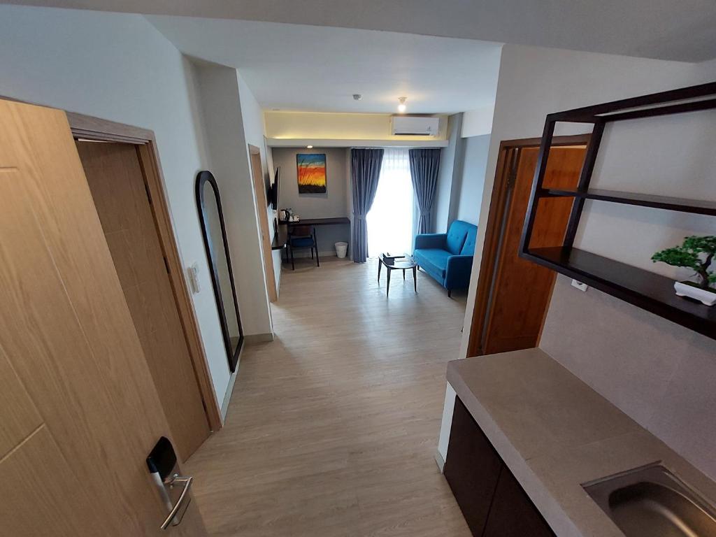 Postel nebo postele na pokoji v ubytování Sienna Residence Bogor