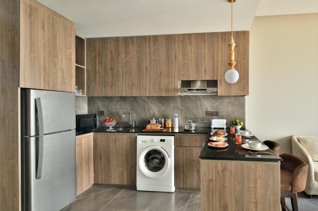 Kuchyň nebo kuchyňský kout v ubytování Citadines Paras Square Gurugram