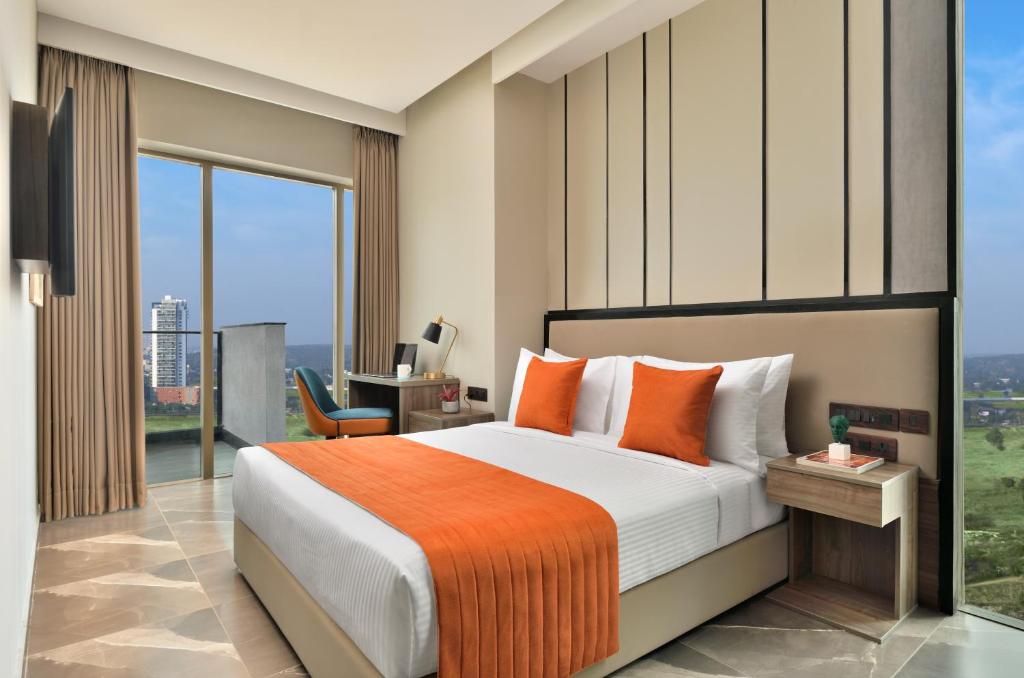 Postel nebo postele na pokoji v ubytování Citadines Paras Square Gurugram