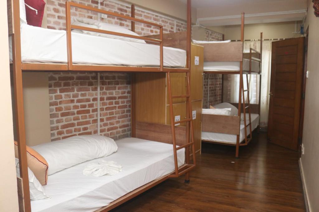 Postel nebo postele na pokoji v ubytování Hotel Vacation Home