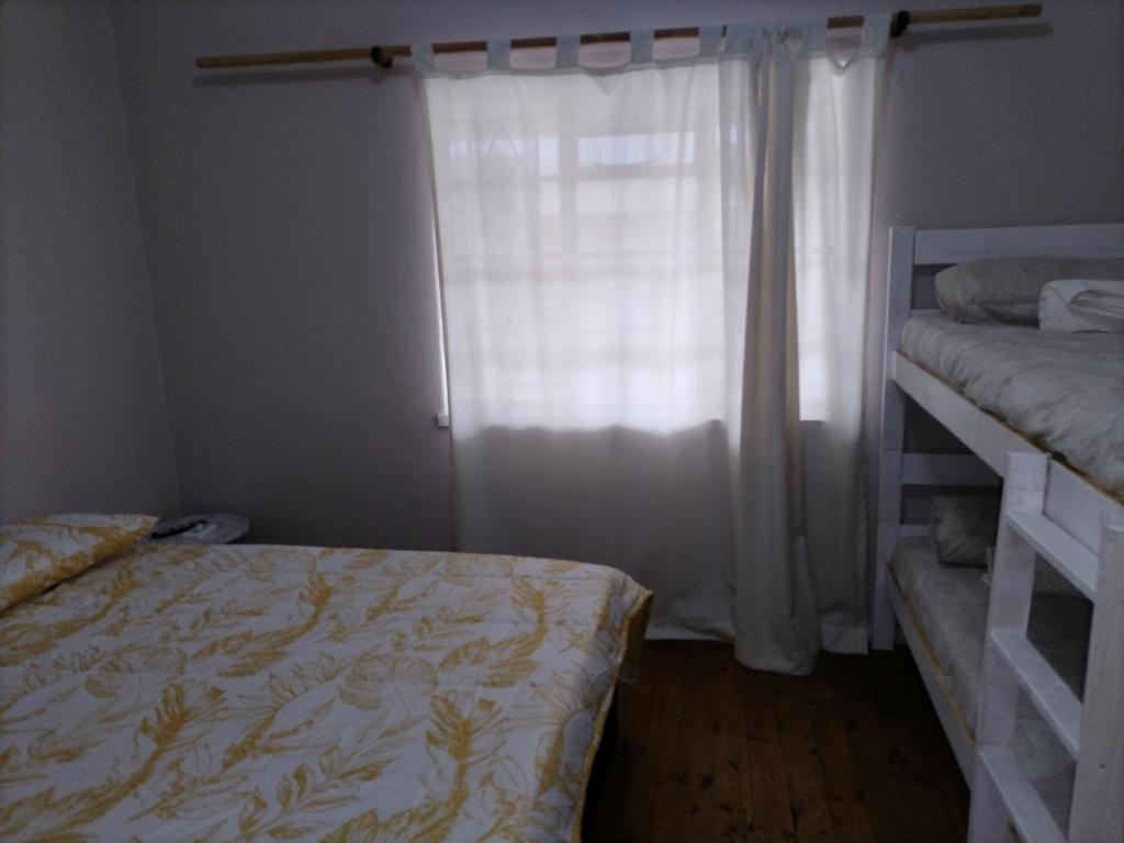 Posteľ alebo postele v izbe v ubytovaní Karoo C