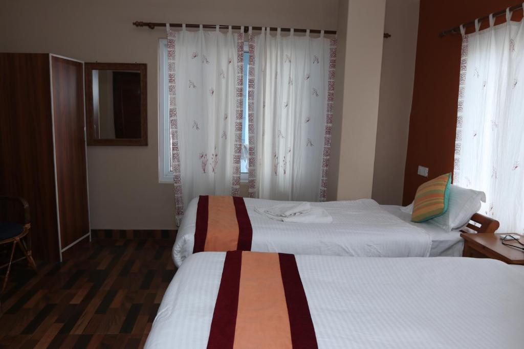 Postel nebo postele na pokoji v ubytování Hotel Vacation Home