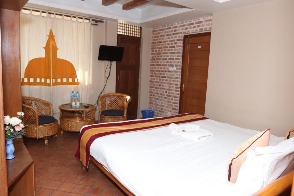 Postel nebo postele na pokoji v ubytování Hotel Vacation Home