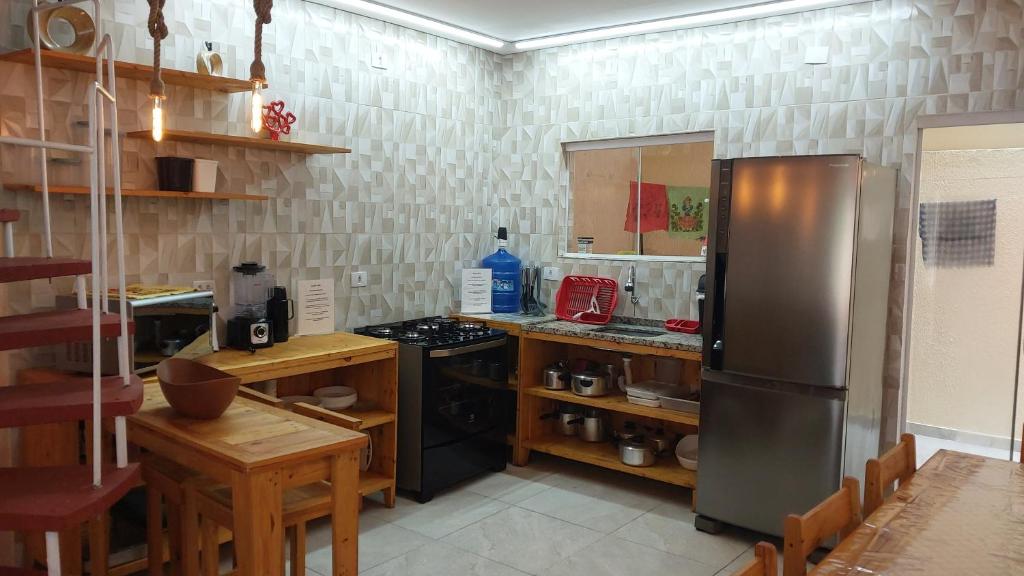 A cozinha ou cozinha compacta de Casa na Praia do Sapê - Piscina - Churrasqueira