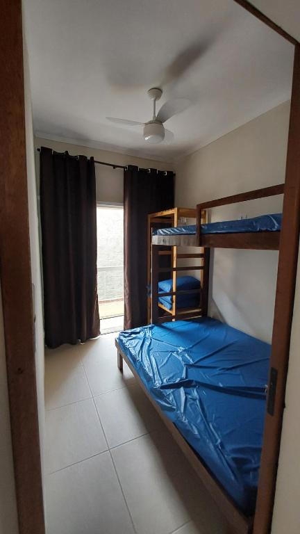 Cama ou camas em um quarto em Casa na Praia do Sapê - Piscina - Churrasqueira