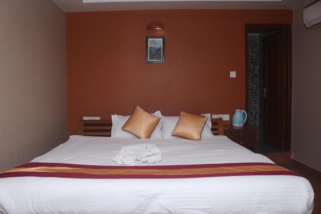 Postel nebo postele na pokoji v ubytování Hotel Vacation Home