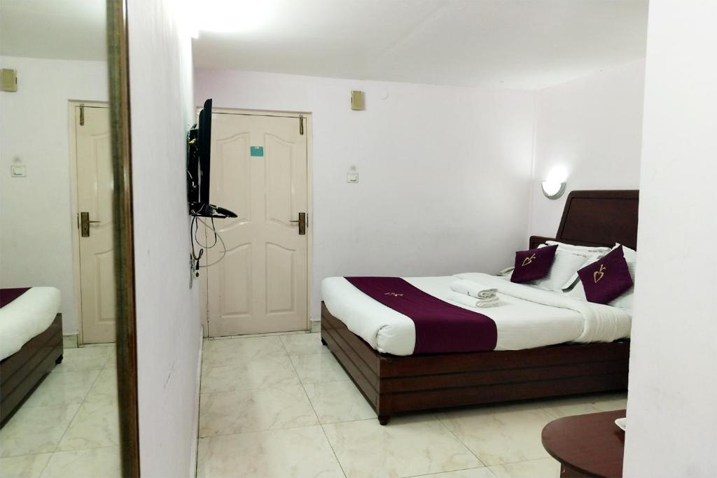 Postel nebo postele na pokoji v ubytování Hotel Mount View