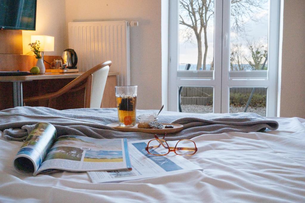 Postel nebo postele na pokoji v ubytování Hotel Alte Fischereischule