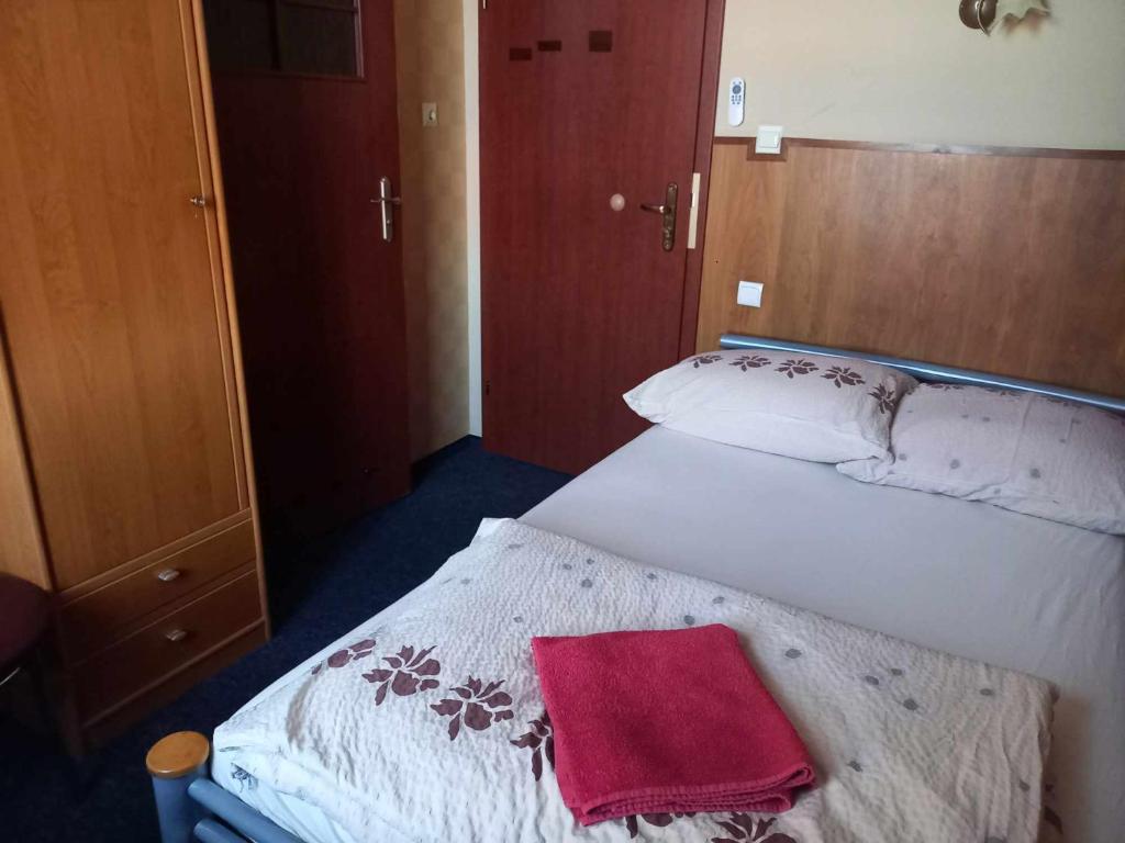 Postel nebo postele na pokoji v ubytování Miltex