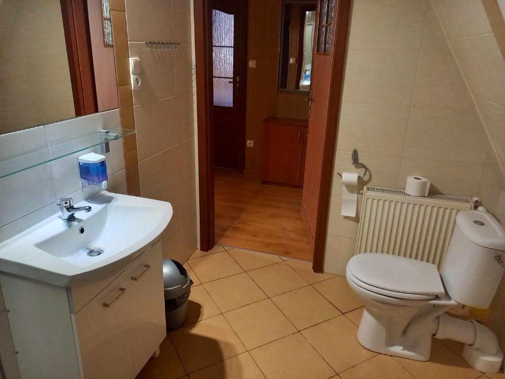 Koupelna v ubytování Miltex