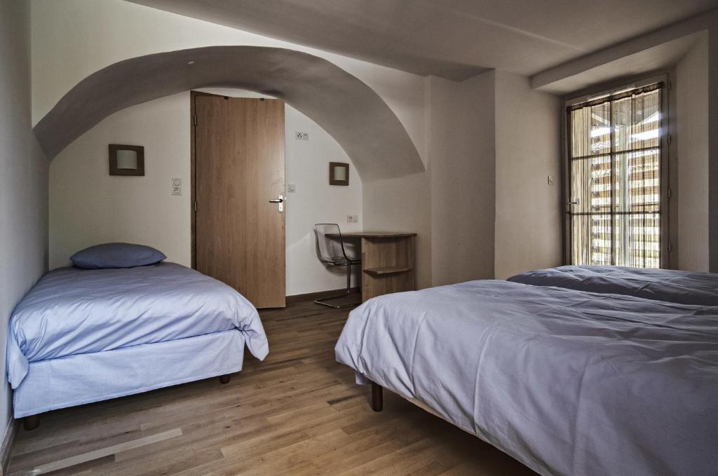 Кровать или кровати в номере Hotel Galilee