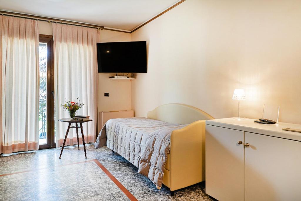 TV a/nebo společenská místnost v ubytování Hotel Daniel