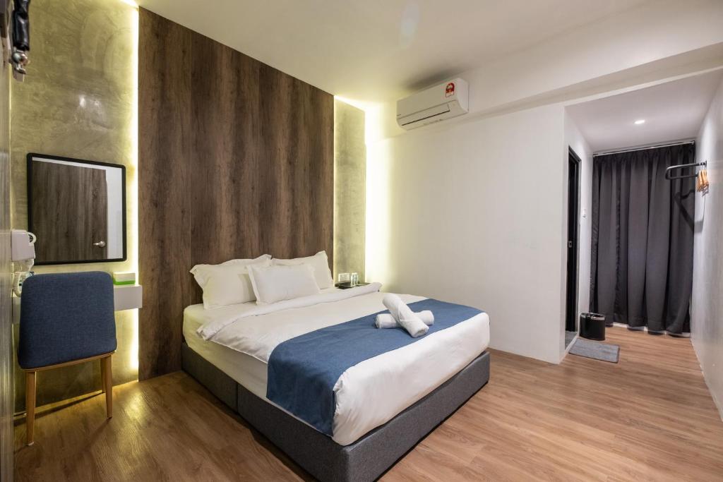 Postel nebo postele na pokoji v ubytování Boutique Hidden loft