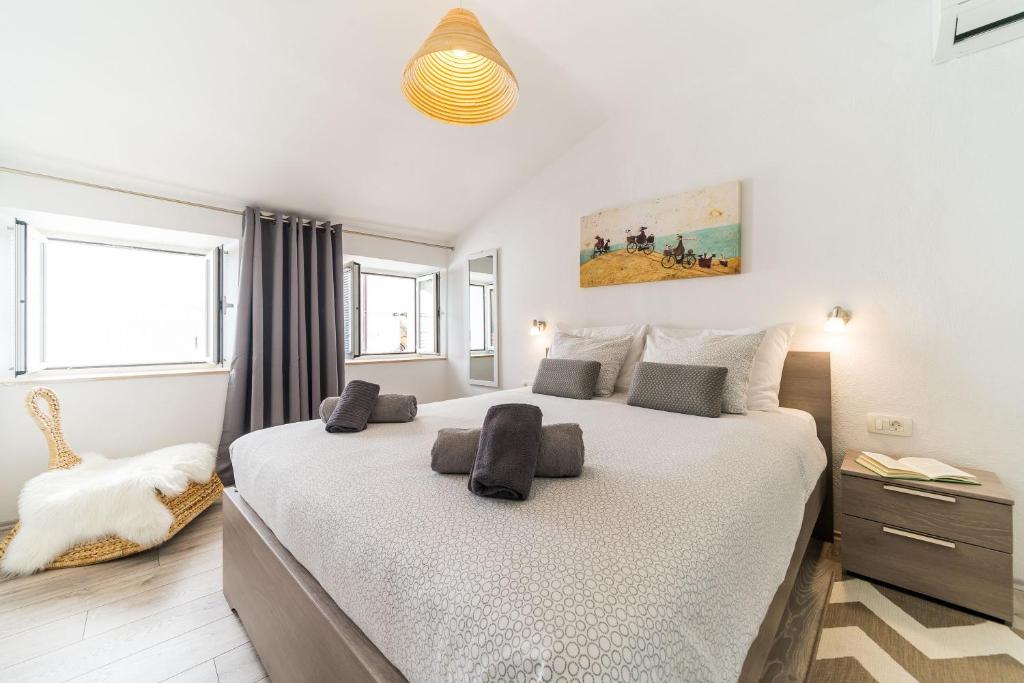 Postel nebo postele na pokoji v ubytování Apartment Mo-Mo