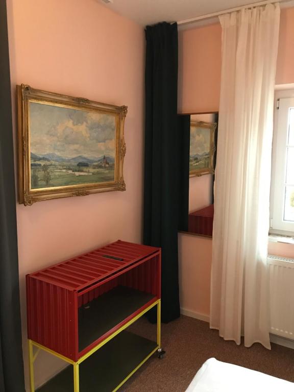 Postel nebo postele na pokoji v ubytování Lèvres Hotel