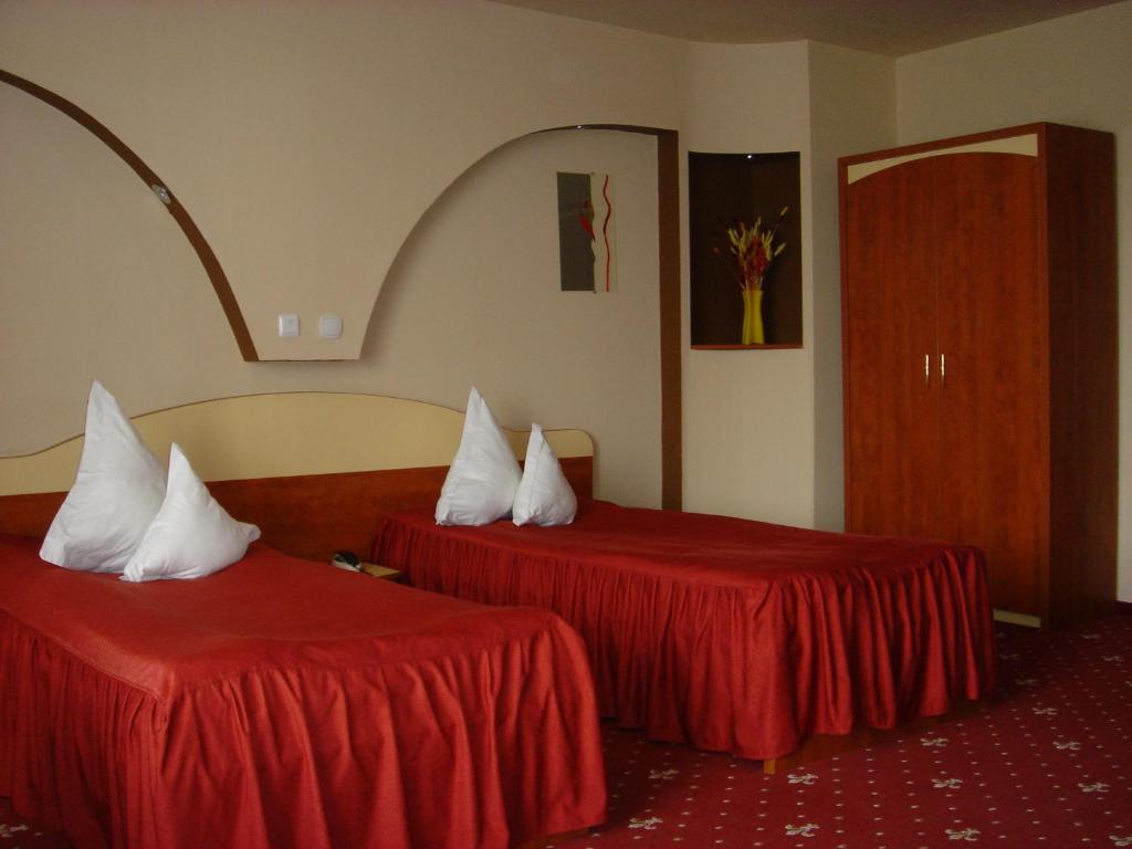 Postel nebo postele na pokoji v ubytování Hotel Kleyn