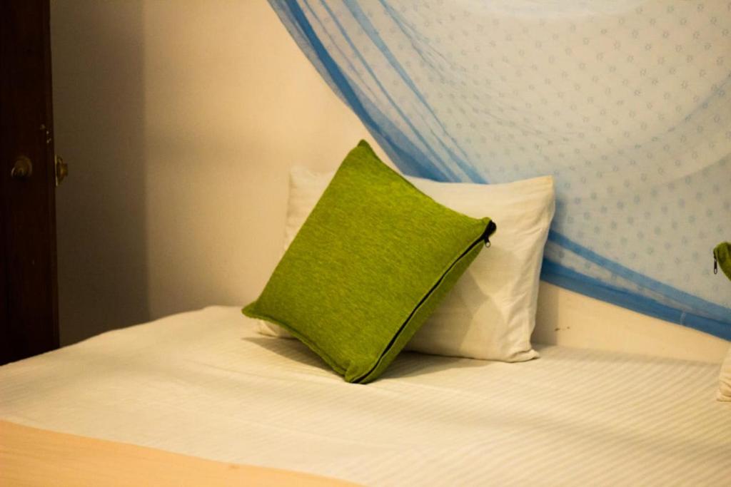 Postel nebo postele na pokoji v ubytování Muru's Place