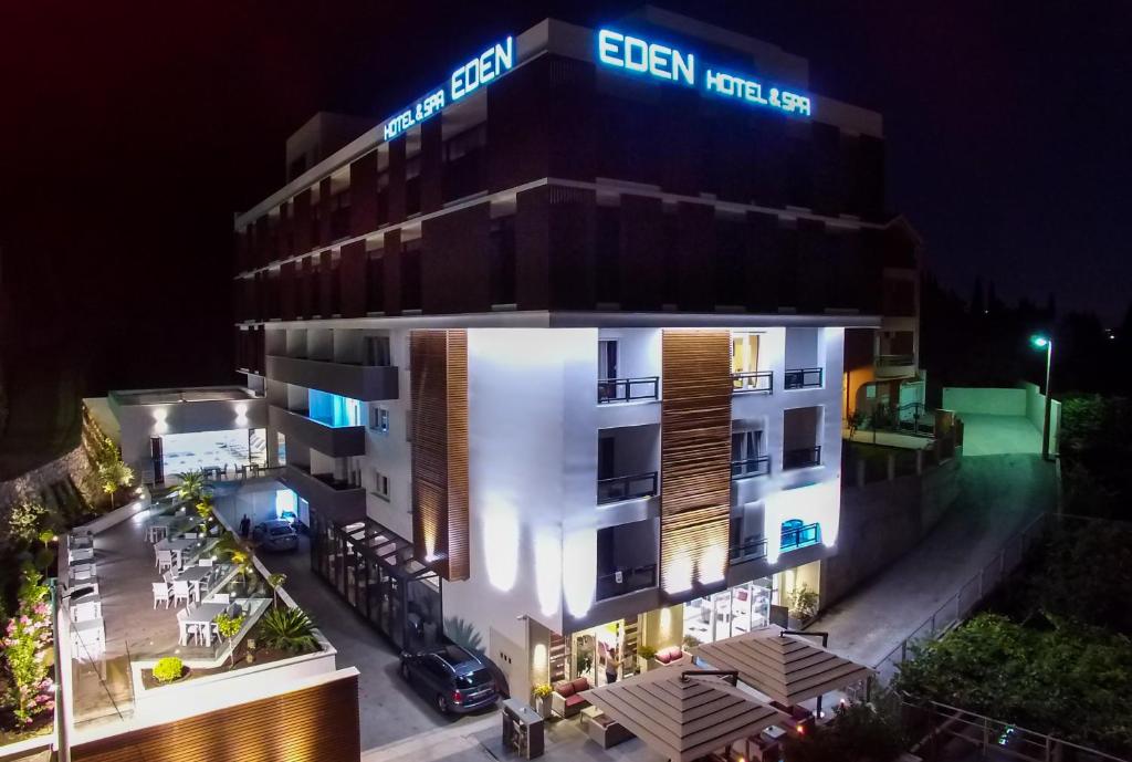 a large building with a lot of lights on at Hotel Eden in Mostar