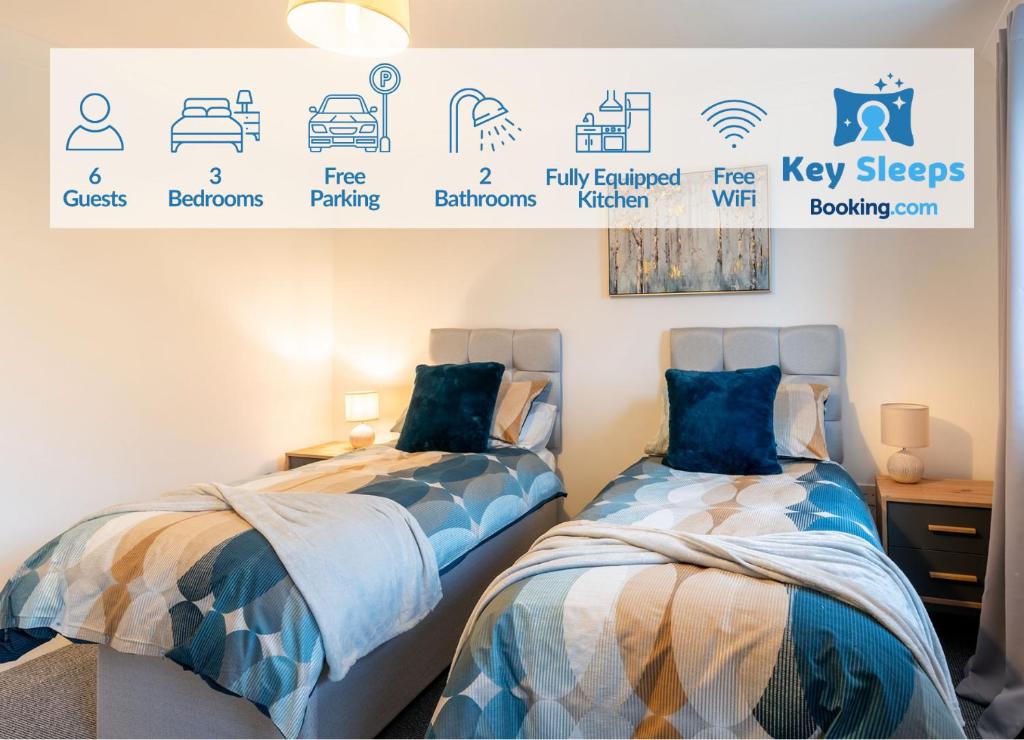 ArmthorpeにあるLarge Family Property & Central Location & Free Parkingのベッド2台が隣同士に設置された部屋です。