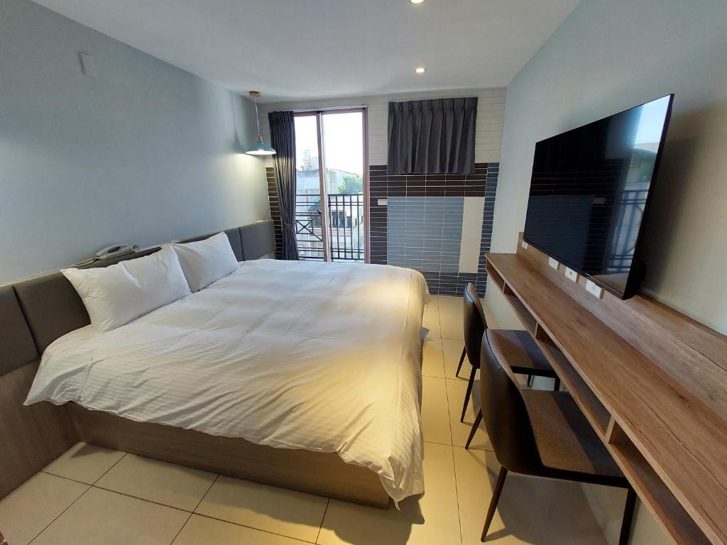 TV a/nebo společenská místnost v ubytování 安平商旅Choona Hotel Anping