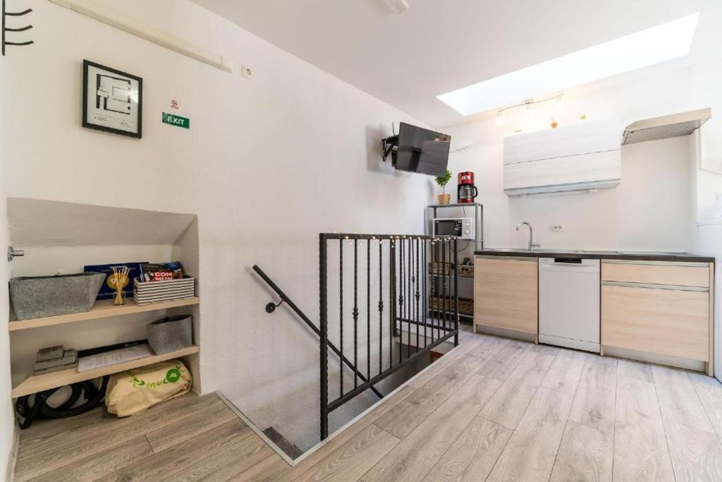 Kuchyň nebo kuchyňský kout v ubytování Apartment Mo-Mo