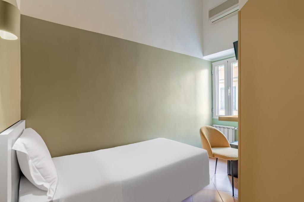 Postel nebo postele na pokoji v ubytování Hotel Infinito - Gruppo BLAM HOTELS