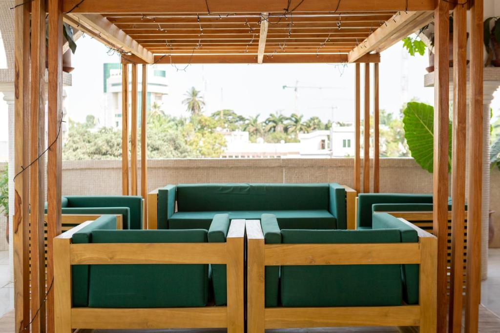 Posezení v ubytování Tamarin Hôtel Cotonou