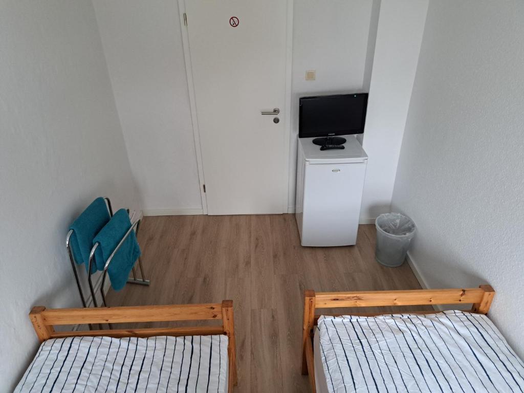 Postel nebo postele na pokoji v ubytování Apartmenthaus Hartl