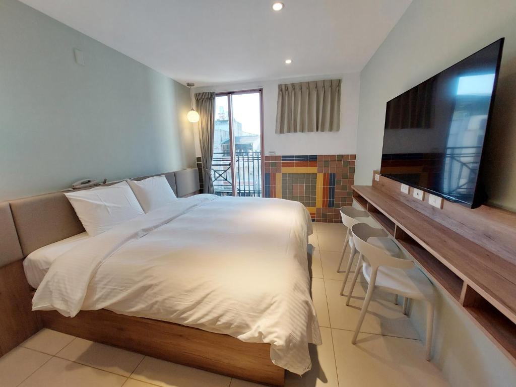 TV a/nebo společenská místnost v ubytování 安平商旅Choona Hotel Anping